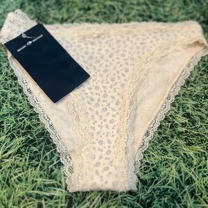 BRANDY MELVILLE WHITE PANTY WITH BLUE FLORAL DESIGN